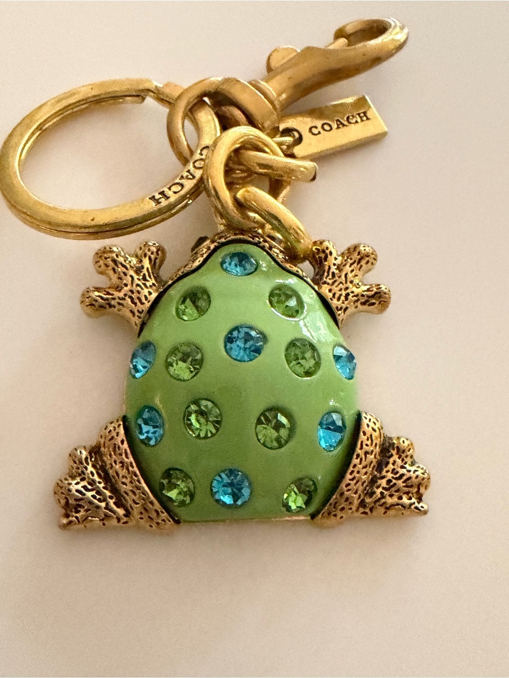 COACH Gold-Tone Green Frog Brooch with Blue and Green Crystals